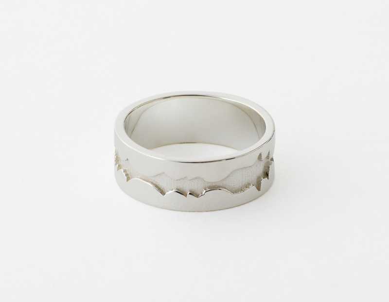The Outer Wave Ring placed horizontal in Sterling Silver
